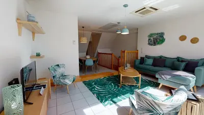 Coin salon dans l'établissement Duplex des Dominicains - 1 Parking GRATUIT - Hypercentre 6 personnes