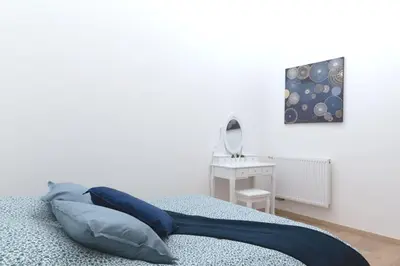 Un ou plusieurs lits dans un hébergement de l'établissement Appartement grand standing VAUBAN 10 Personnes centre historique de Colmar