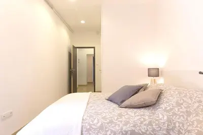 Un ou plusieurs lits dans un hébergement de l'établissement Appartement grand standing VAUBAN 10 Personnes centre historique de Colmar