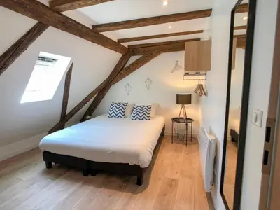 Un ou plusieurs lits dans un hébergement de l'établissement Beauty & The Beast - Old Town Cosy Apartments