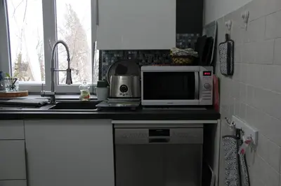 Cuisine ou kitchenette dans l'établissement FLAMBOYANT