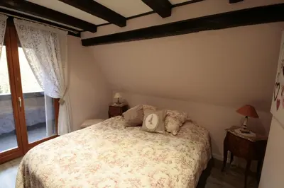 Un ou plusieurs lits dans un hébergement de l'établissement Appartement Louise avec Balcon