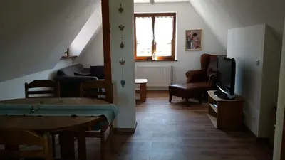 Coin salon dans l'établissement Urlaub im Elsass