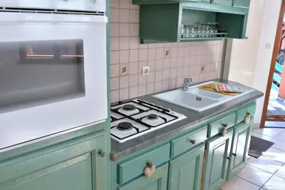 Cuisine ou kitchenette dans l'établissement S'Harzala Vert bis