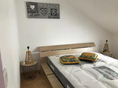 Un ou plusieurs lits dans un hébergement de l'établissement Résidence de l’ex hôtel des roches