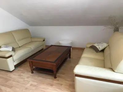 Coin salon dans l'établissement Résidence de l’ex hôtel des roches