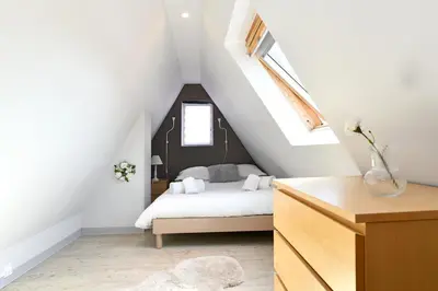 Un ou plusieurs lits dans un hébergement de l'établissement Appartement Villa Joseph