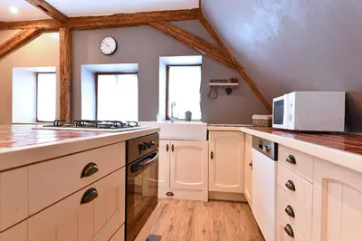 Cuisine ou kitchenette dans l'établissement Appartement Villa Joseph