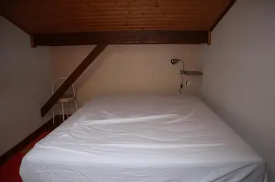 Un ou plusieurs lits dans un hébergement de l'établissement Charmant T3 Bussang, Vosges, vue imprenable