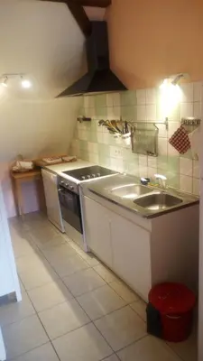 Cuisine ou kitchenette dans l'établissement Gîte Yves