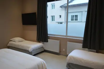 Un ou plusieurs lits dans un hébergement de l'établissement Hôtel Timgad