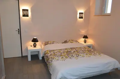 Un ou plusieurs lits dans un hébergement de l'établissement Hôtel Timgad