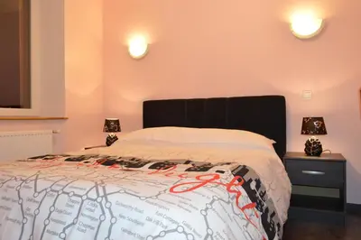 Un ou plusieurs lits dans un hébergement de l'établissement Hôtel Timgad