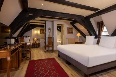 Un ou plusieurs lits dans un hébergement de l'établissement Hotel Restaurant Le Maréchal - Teritoria