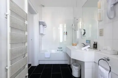 Salle de bains dans l'établissement Hotel Du Parc - Mulhouse Centre