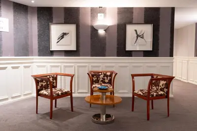 Coin salon dans l'établissement Grand Hôtel Du Tonneau D'Or