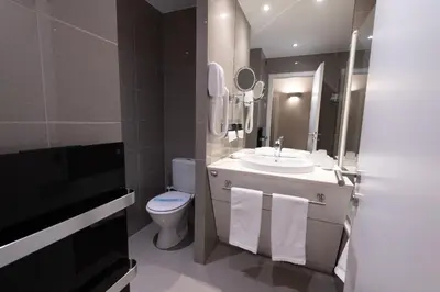 Salle de bains dans l'établissement Grand Hôtel Du Tonneau D'Or