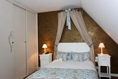 Un ou plusieurs lits dans un hébergement de l'établissement Hôtel Restaurant Verger des Châteaux, Route des vins Haut-Koenigsbourg