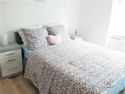Un ou plusieurs lits dans un hébergement de l'établissement Comfort Stay Basel Airport 1A46