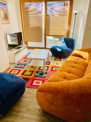 Coin salon dans l'établissement Gîte Spa La grange