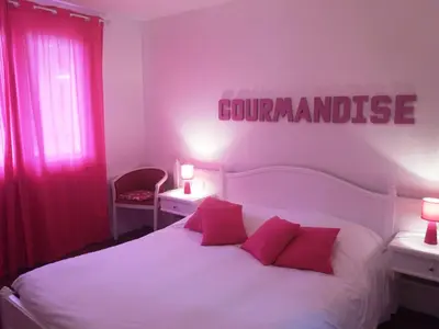 Un ou plusieurs lits dans un hébergement de l'établissement Hôtel De La Paix