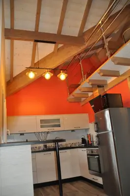 Cuisine ou kitchenette dans l'établissement les charmes du lac Sauna et Spa