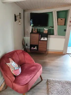 Coin salon dans l'établissement Les abris de la hulotte