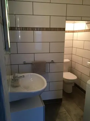 Salle de bains dans l'établissement Huna’gîte