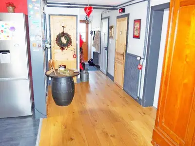 Cuisine ou kitchenette dans l'établissement Appartement Maison Vosgienne La Bresse Centre