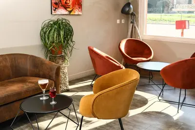 Coin salon dans l'établissement Hôtel restaurant Relais de Rixheim Ile Napoléon Mulhouse
