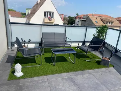 Balcon ou terrasse dans l'établissement Appartement Magnîolia proche centre Ville