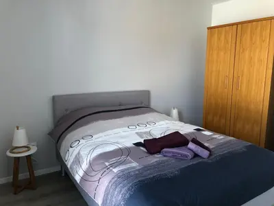 Un ou plusieurs lits dans un hébergement de l'établissement Appartement Magnîolia proche centre Ville
