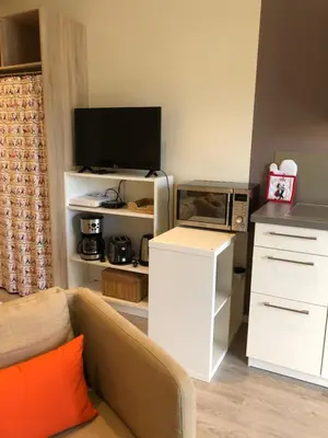 Télévision ou salle de divertissement dans l'établissement Quiet Corner
