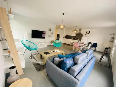 Télévision ou salle de divertissement dans l'établissement Appartement Orchidées proche centre Ville