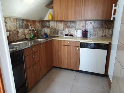 Cuisine ou kitchenette dans l'établissement GRENIER DES CIGOGNES