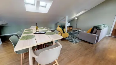 Coin salon dans l'établissement L'Entêté CLIM HYPERCENTRE 5-7 personnes