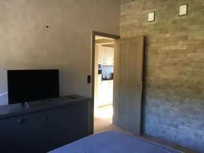 Télévision ou salle de divertissement dans l'établissement GITE AVEC VUE MAGNIFIQUE