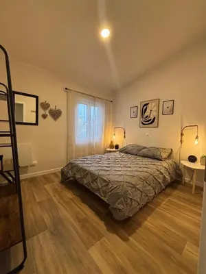 Un ou plusieurs lits dans un hébergement de l'établissement LE PIED A TERRE SELESTADIEN