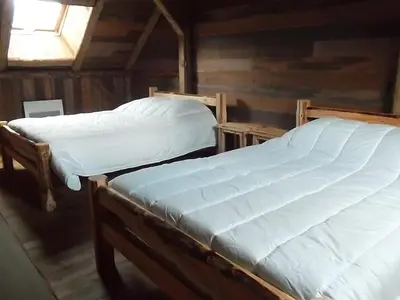 Un ou plusieurs lits dans un hébergement de l'établissement gîte 8 personnes 