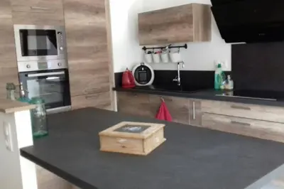 Cuisine ou kitchenette dans l'établissement Les écureuils