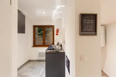 Cuisine ou kitchenette dans l'établissement Travel Homes - L'Arsenal, studios en hyper centre