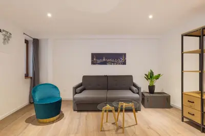 Coin salon dans l'établissement Travel Homes - L'Arsenal, studios en hyper centre