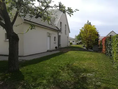 Jardin de l'établissement Charmant sudio aux portes de Colmar