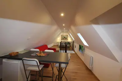 Coin salon dans l'établissement Chambre chez l'habitant - L Écureuil - Cœur de Riquewihr - 2 personnes