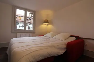 Un ou plusieurs lits dans un hébergement de l'établissement Chambre chez l'habitant Le Rouge-Gorge - Cœur de Riquewihr - 2 personnes