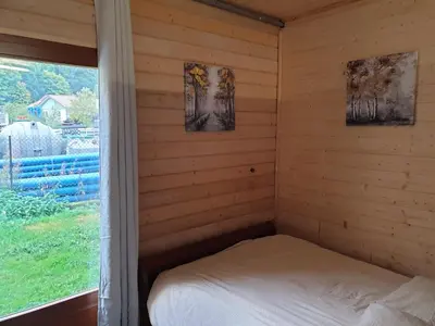 Un ou plusieurs lits dans un hébergement de l'établissement JACUZZI PRIVE Romann 1