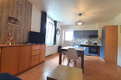 Cuisine ou kitchenette dans l'établissement Appart La Bresse - Idéal Famille - Entre Village et Station
