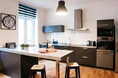 Cuisine ou kitchenette dans l'établissement LE 17