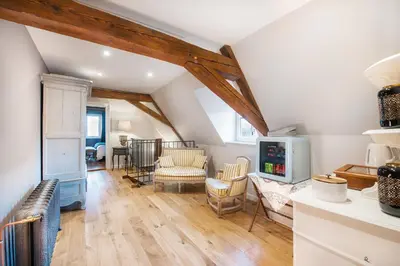 Coin salon dans l'établissement Le Clos Marguerite - Maison d'Hôtes
