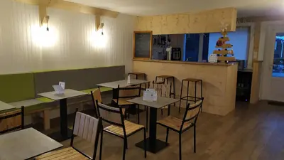 Coin salon dans l'établissement Tiny House - Cottages - Mobilhomes - Camping Les Granges Bas